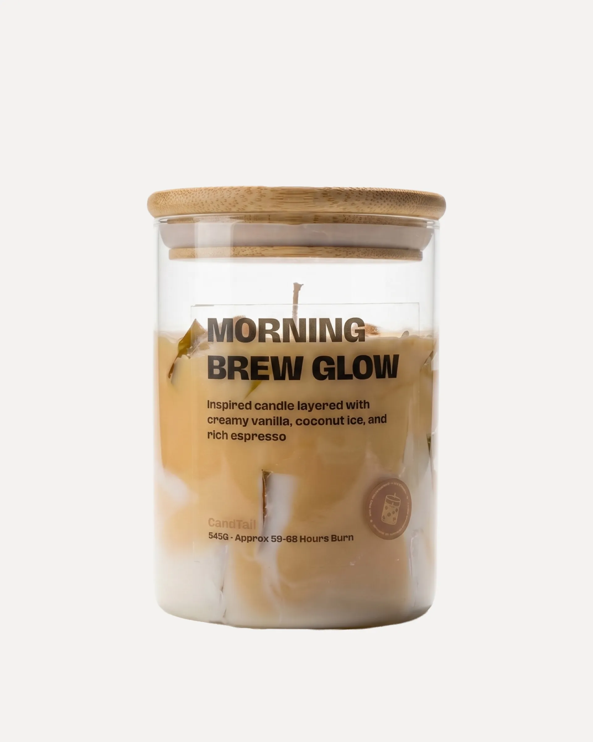 Morning Brew Glow candle in a glass jar with a bamboo lid