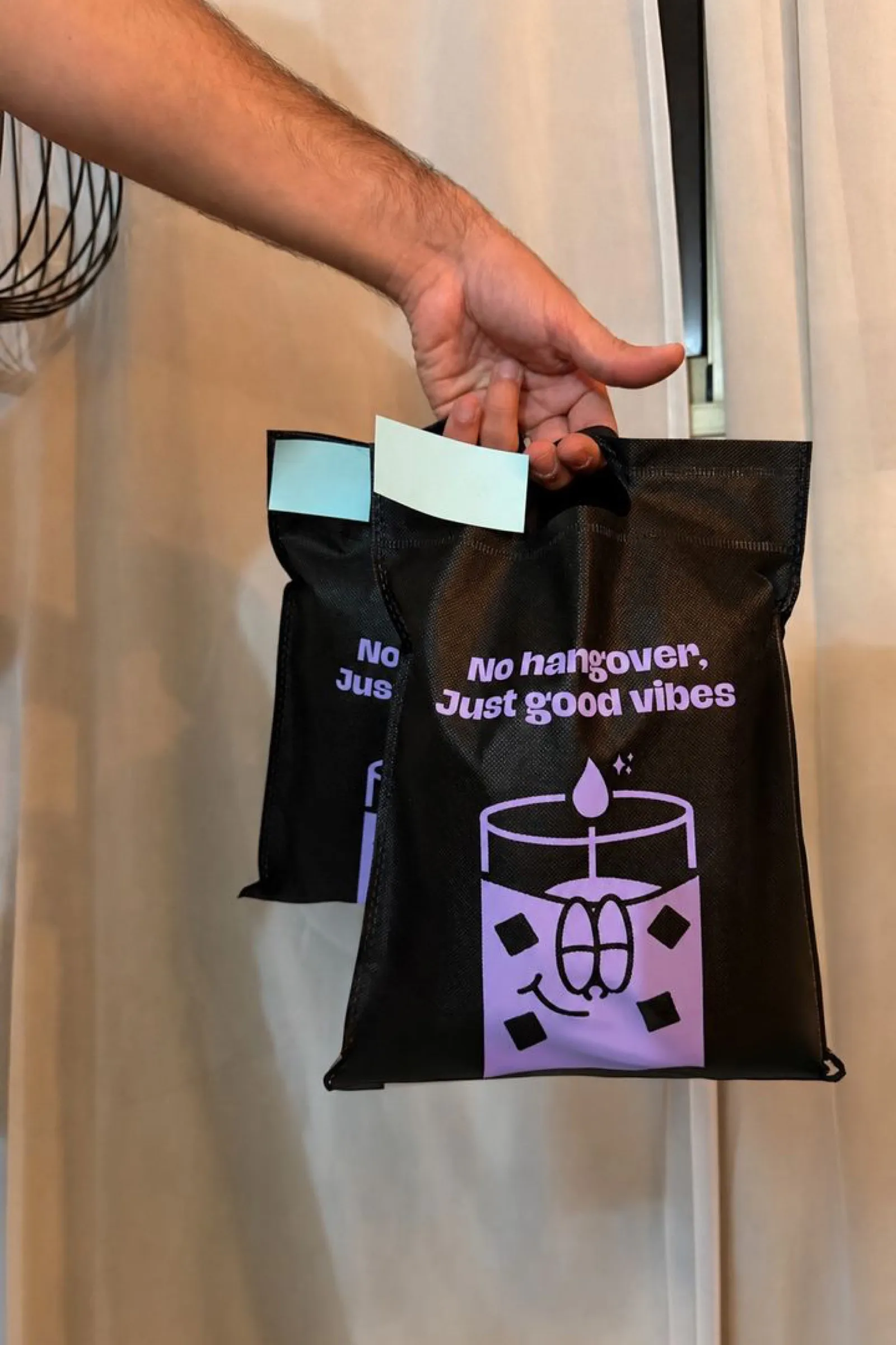 Two branded Candtail bags ready for pickup
