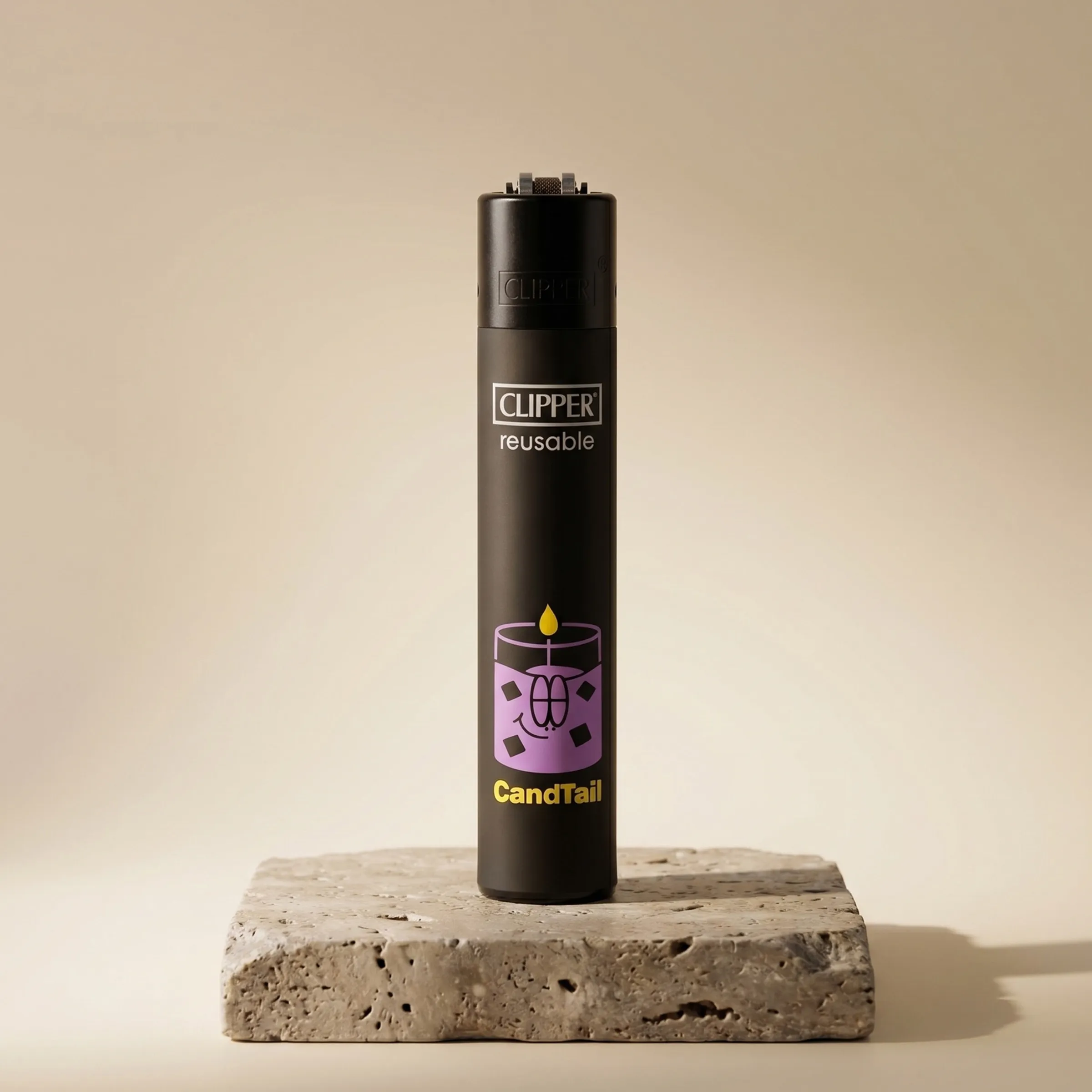 The black Candtail lighter on a travertine block (AI-assisted setting)