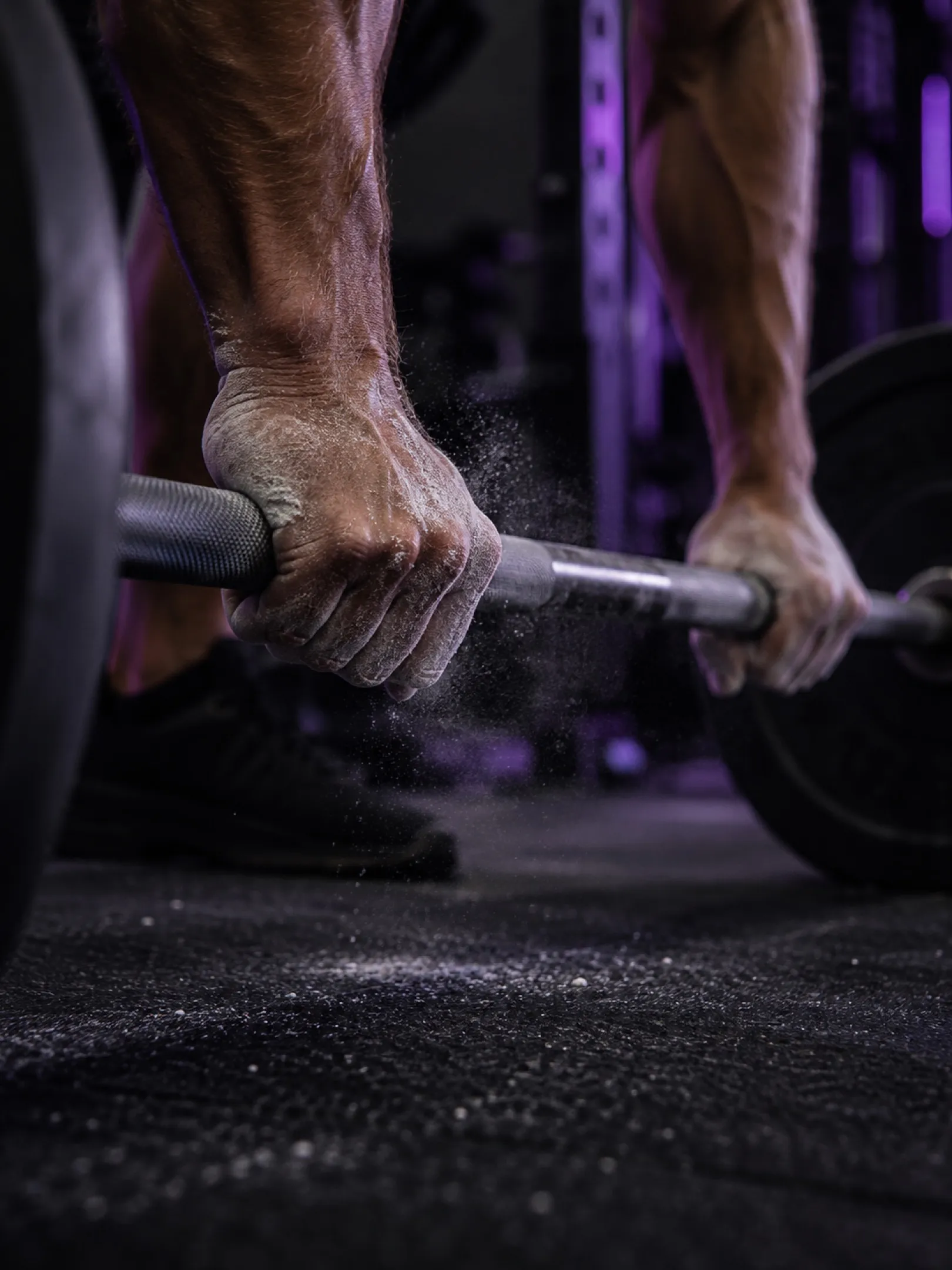 AI-generated campaign image: chalked hands gripping a loaded barbell